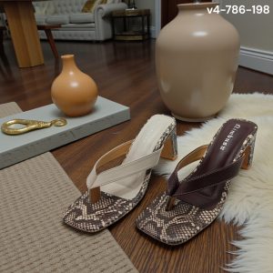 snakeskin tall heels